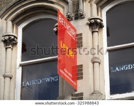 Andover, High Street, Hampshire, England - October 10, 2015: Commercial vacant offices let by sign over retail units