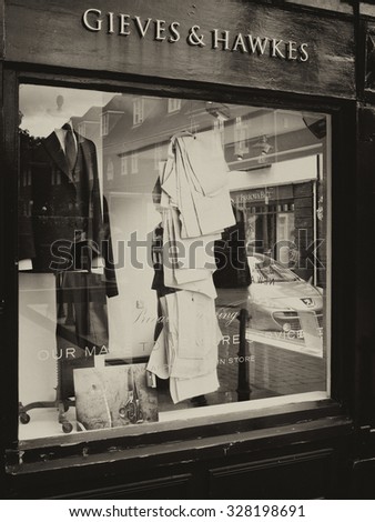 Winchester, The Square, Hampshire, England - September 4, 2015: Gieves and Hawkes bespoke gentleman tailors, one of the oldest continual bespoke tailoring companies in the world