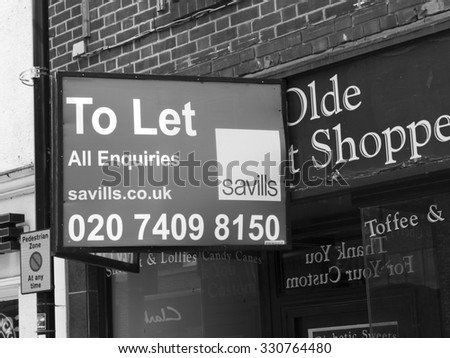 Newbury, High Street, Berkshire, England - August 21, 2015: Commercial to let sign over vacant shop unit