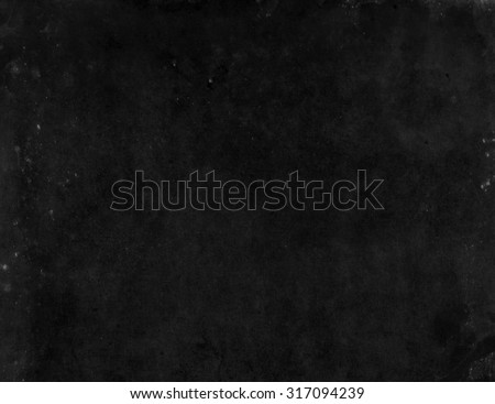 Black background. Grunge black background. Black background with spotlight