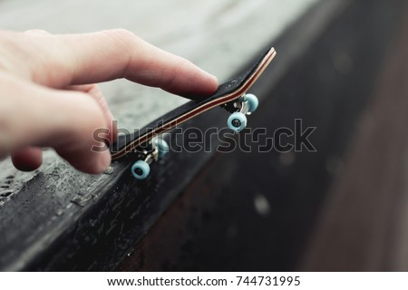 Fingerboard. Skateboard. Hobbies. Background texture 商業照片 © 