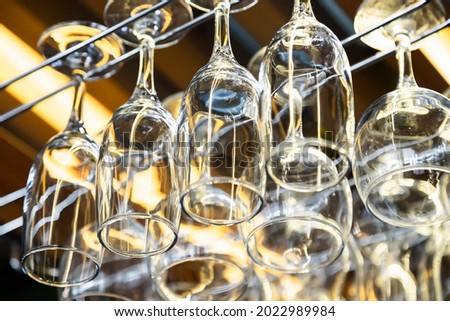 Similar – Image, Stock Photo Clean glasses hanging in bar