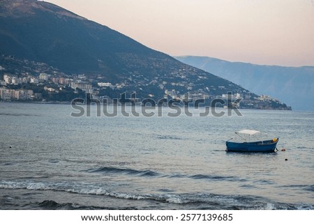 Similar – Image, Stock Photo Boat floating in calm sea water