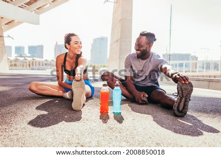 Similar – Image, Stock Photo Woman drinking isotonic drink while resting