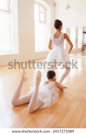 Similar – Image, Stock Photo Anonymous ballerina performing dance against white wall