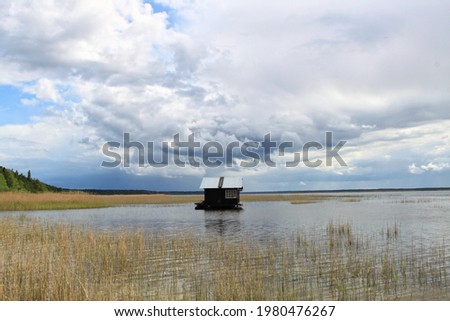 Tiny floating house on the lake Stock foto © 