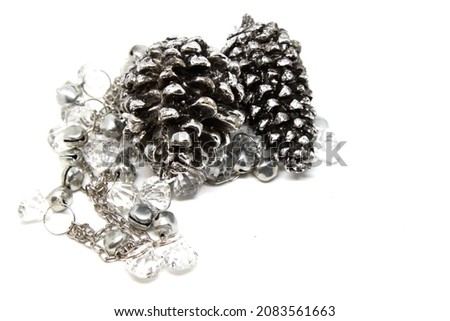Christmas decoration silver pine and garland with small silver bell. Selective focus. High quality photo 商業照片 © 
