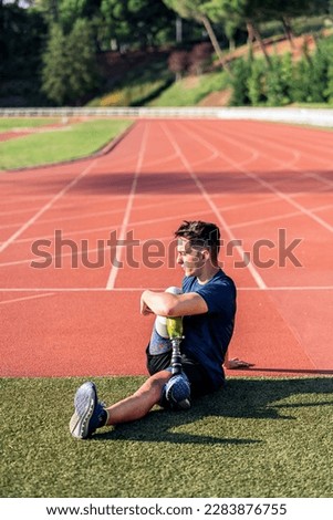 Similar – Image, Stock Photo Disabled man athlete stretching with leg prosthesis.