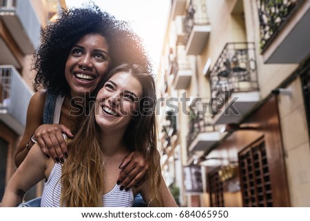 Similar – Image, Stock Photo Lesbian couple laughing together