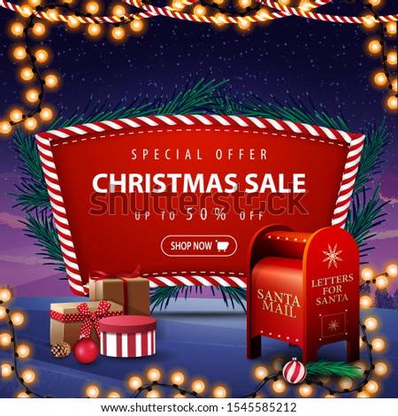 Special offer, Christmas sale, up to 50% off, red discount banner with Christmas tree branches, garland, winter landscape on the background and Santa letterbox with presents