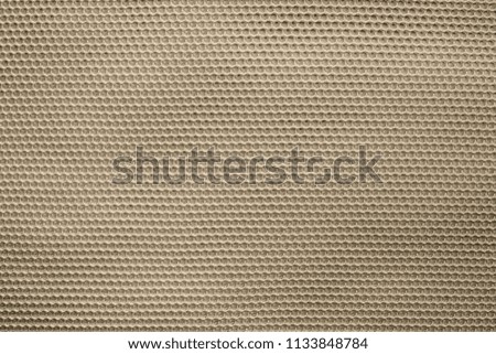 empty and clean background or wallpaper with abstract mesh texture of fabric or textile material a closeup of sepia color