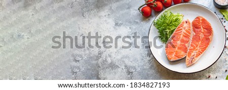 salmon fish red steak fillet raw seafood copy space for text diet pescetarian food background rustic