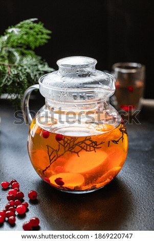 fruit tea teapot fresh fruits and berries citrus hot beverage mint and other warming drink in a kettle on the table healthy top view copy space for text food background rustic
