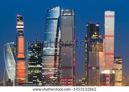 Creative Moscow city skyline backdrop at night 