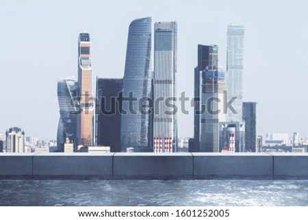 Bright Moscow city skyline background with daylight and skyscrapers