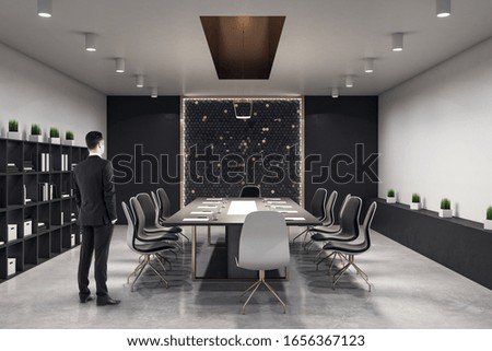 Similar – Image, Stock Photo A glass white lamp shines with yellow light on a green background. New idea