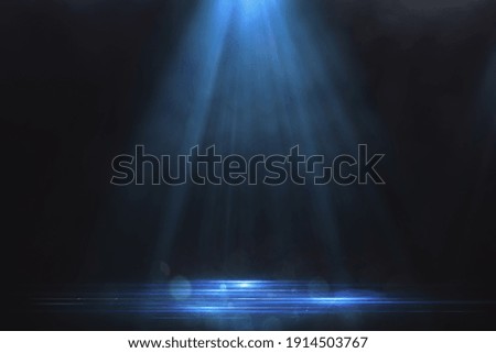 Blue spotlight background and glowing electric blue lines on the floor with smoke