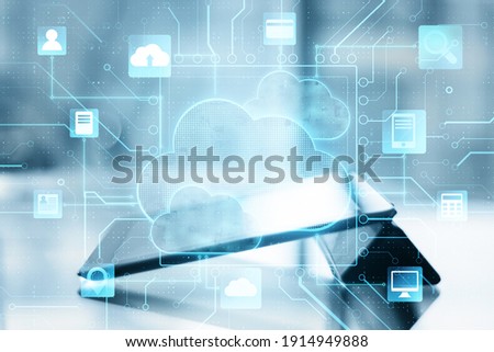 Cloud internet technology concept: digital screen with cloud service application icons and digital tablet on the table