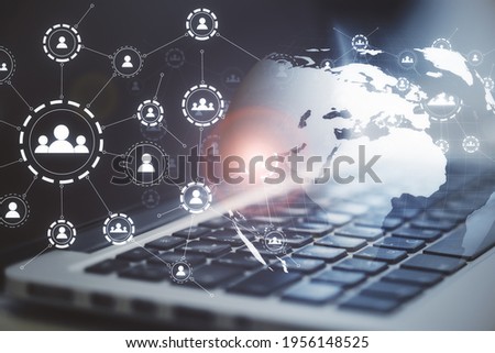 Multiple application icons with a laptop in the background, social media and interaction concept, double exposure