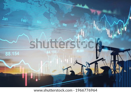 Rise in gasoline prices concept with double exposure of digital screen with financial chart graphs and oil pumps on a field Stockfoto © 