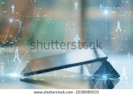 Close up of tablet on desktop with creative glowing connected people icons on blurry background. Population count and digital transformation concept. Double exposure