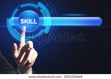 Close up of man hand pointing at abstract glowing skill bar on blue background with mock up place. Training, education, technology and improvement concept