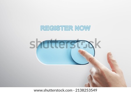 Close up of male finger turning on slider button on white background. Registration and success concept