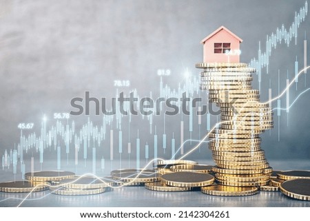 Abstract glowing candlestick forex chart on blurry golden coins backdrop. Money, economy and finance concept. Double exposure