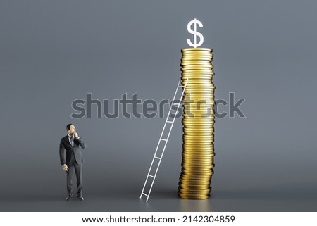 Attractive young european businessman looking at huge golden coin pile with ladder and dollar sign on gray background. Inflation, crisis and economy concept