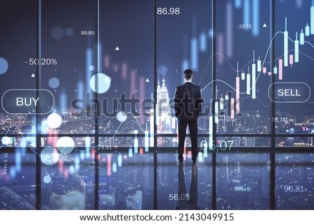 Back view of business man standing in dark office interior with big data index, forex chart and city view. Double exposure
