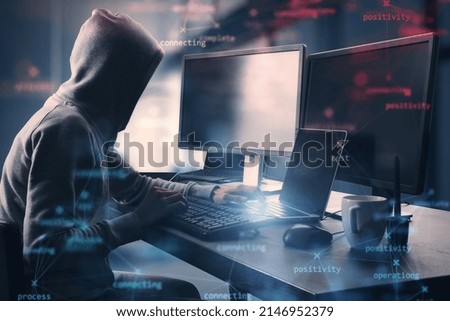 Side view of hacker at desktop using computers with creative process stages mesh on blurry office interior background. Hacking, system and software concept. Double exposure