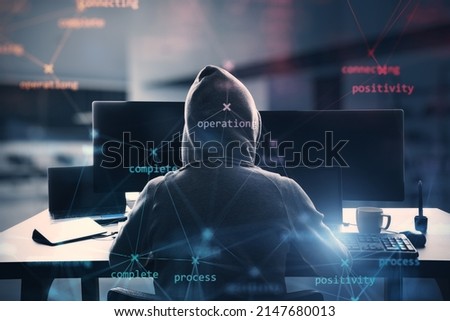 Back view of hacker at desktop using computers with creative process stages mesh on blurry office interior background. Hacking, system and software concept. Double exposure