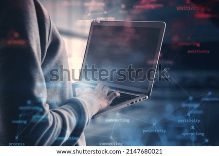 Close up of hacker hand using mock up screen laptop with creative process stages mesh on blurry office interior background. Hacking, system and software concept. Double exposure