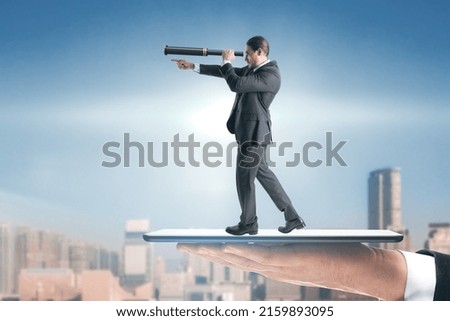 Abstract image of businessman with telescope looking into the distance while standing on tablet. Future, market research and success concept. City background with mock up place