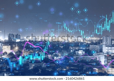 Forex market exchange concept with double exposure of night megapolis city and abstract technology background with digital financial graphs and growing candlestick