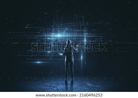 Working and surfing in virtual reality and cyber space concept with back view on human in sport suit looking at digital display with crossing virtual lines