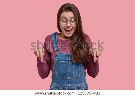 Similar – Image, Stock Photo Glad woman showing photo gesture near wall outdoors