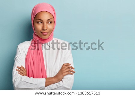 Similar – Image, Stock Photo Woman with pink scarf for cancer looking at the sea in bikini from the beach