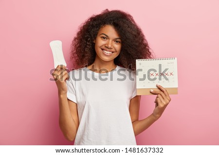 Similar – Image, Stock Photo Intimate portrait of afro latina with shadows in face