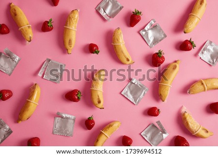 Similar – Image, Stock Photo Condom on banana in hand of crop person