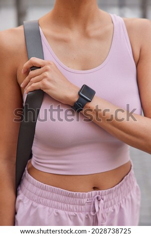 Similar – Image, Stock Photo Unrecognizable sportswoman exercising with elastic band at home