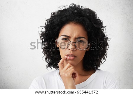 Similar – Image, Stock Photo thoughtful afro woman with closed eyes in a garden