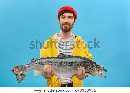 Similar – Image, Stock Photo Big fish with red tail in plate