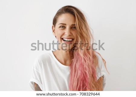 Similar – Image, Stock Photo Young and trendy woman in a sunny day sitting on the beach