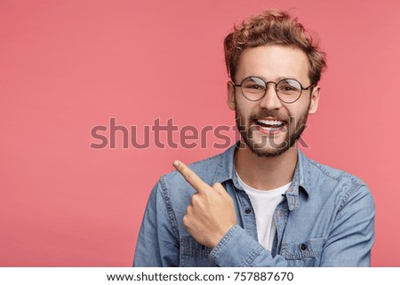 Similar – Image, Stock Photo Here we have the salad | cable tangle and a green telephone on a wooden shelf in front of a white wall