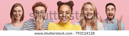 Isolated shot of multiethnic group of people express positive emotions, have pleasant smile on faces, gesture actively, being very emotional, recieve good news, pose against pink background.