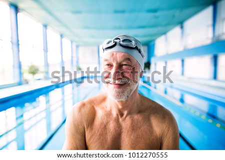 Similar – Image, Stock Photo Active senior man swimming and splashing in water