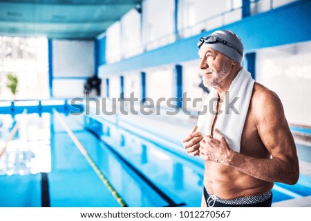 Similar – Image, Stock Photo Active senior man swimming and splashing in water