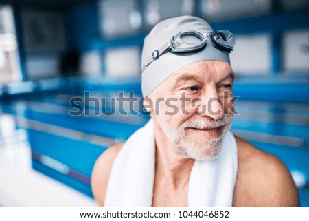 Similar – Image, Stock Photo Active senior man swimming and splashing in water