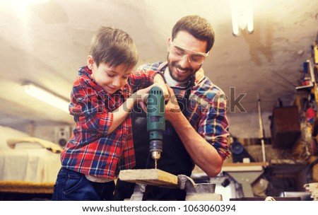 Similar – Image, Stock Photo Male woodworker teaching son in workshop